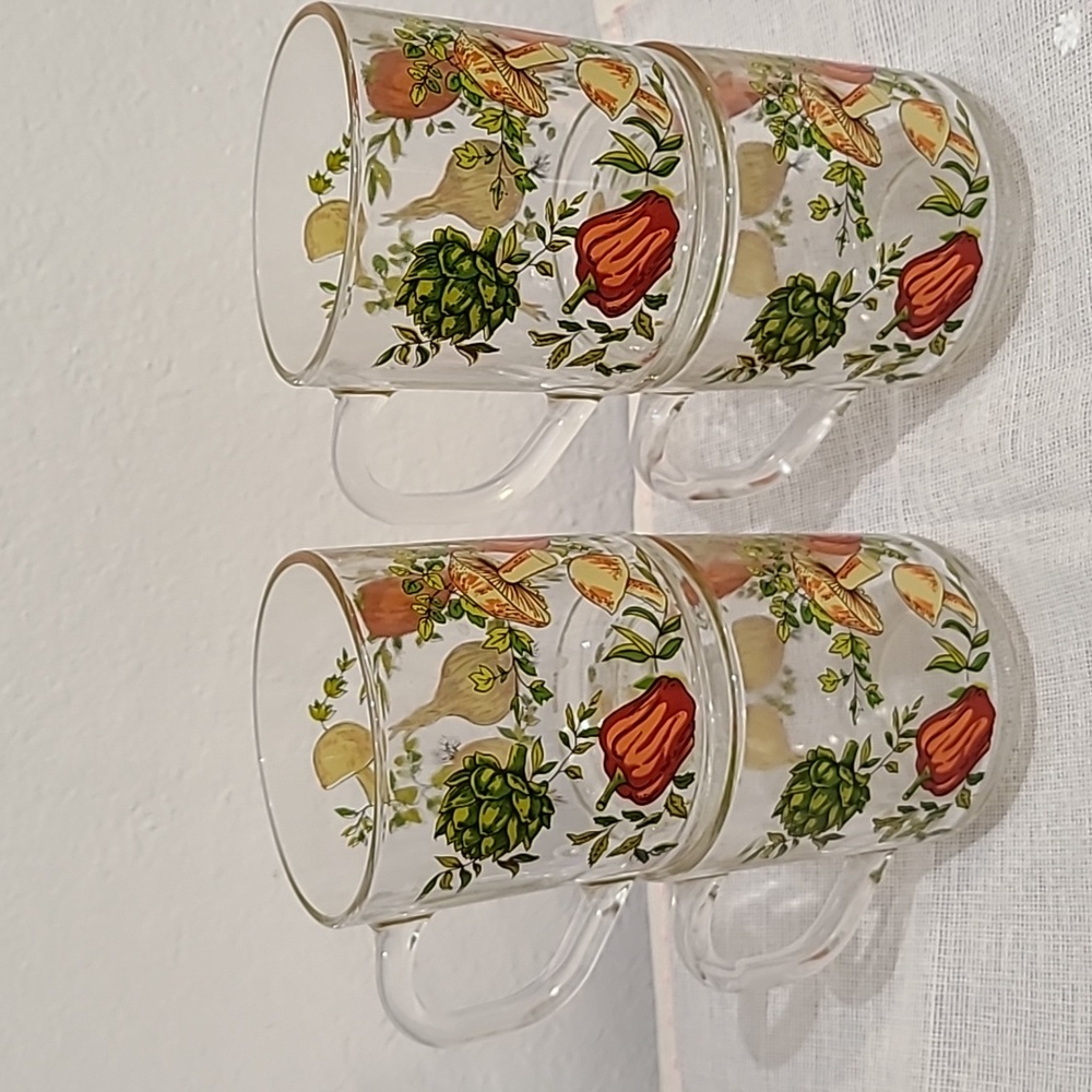 Vintage set of four Arcoroc France clear mugs w/ vegetable design.